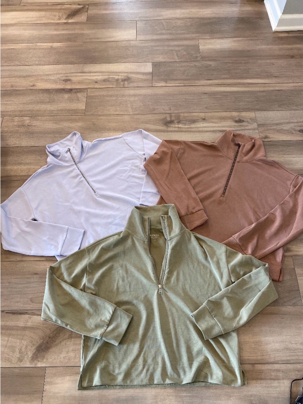 3 athleta seasoft quarter zips. Size medium.